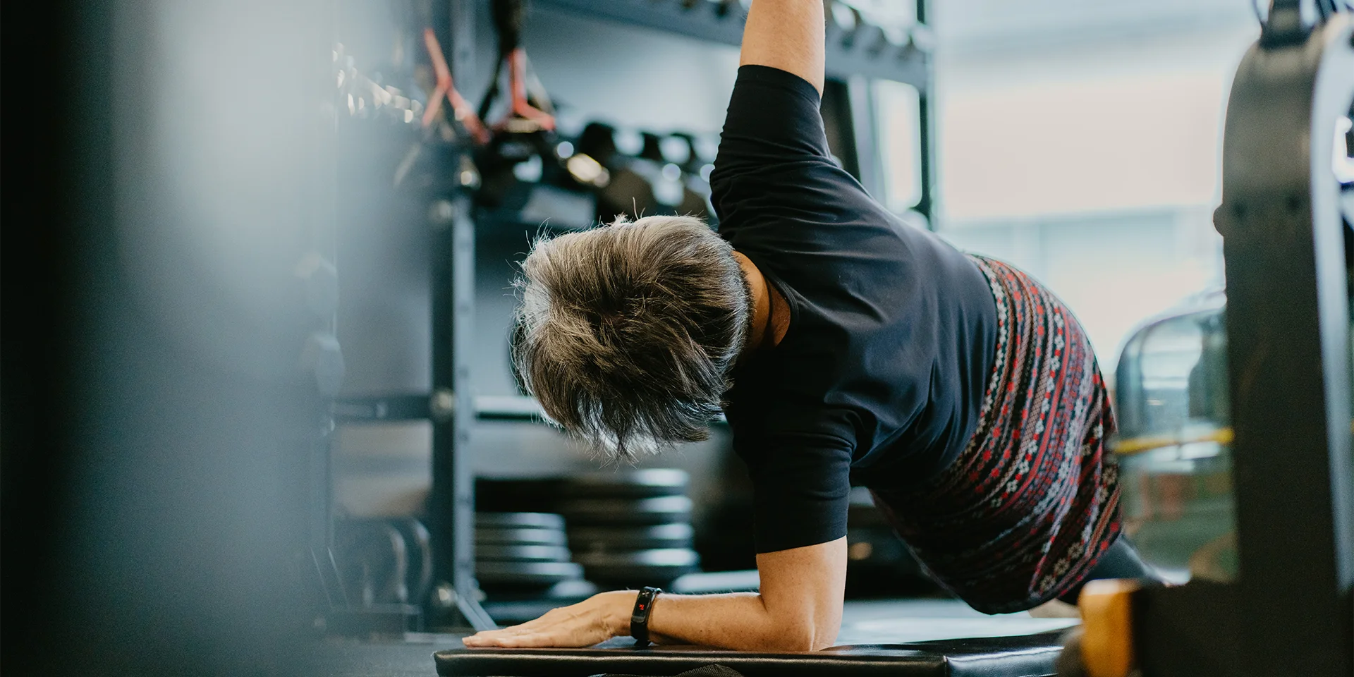 Coach leading strength and balance training in fitness for seniors in Plainfield