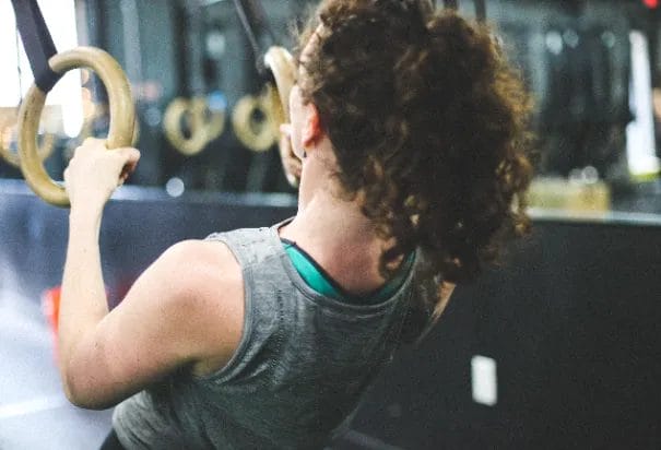 Woman training with ropes